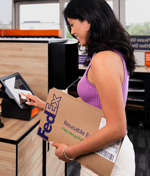 FedEx self-service kiosk with QR scanner